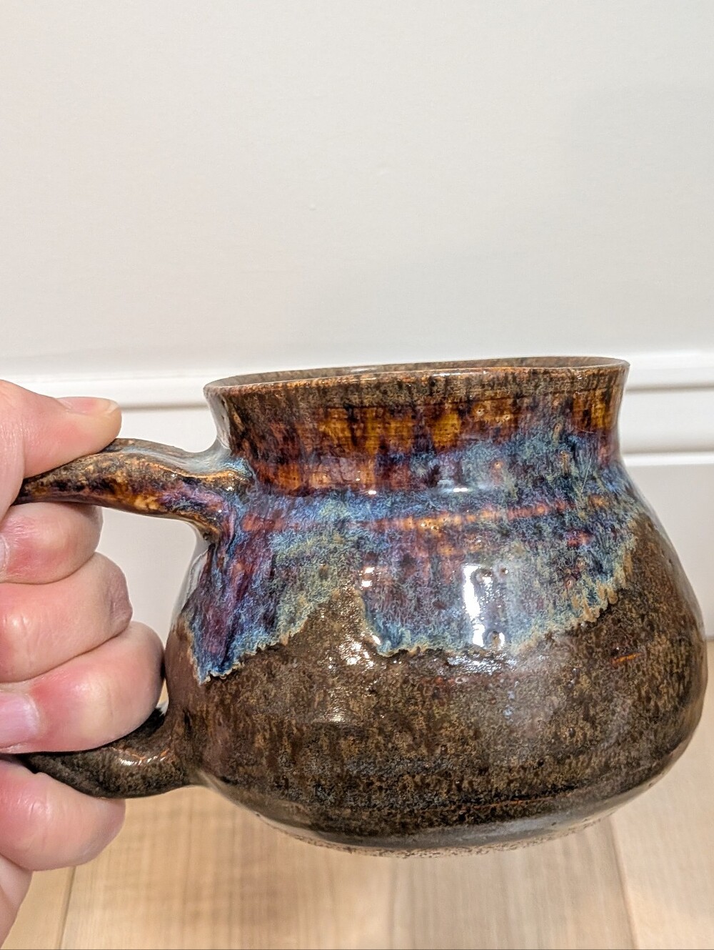 Handmade Ceramic Mug in Brown with Iridescent Blue Accents